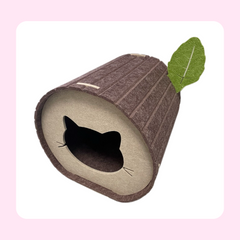 Tree stump-shaped cat bed