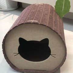 Tree stump-shaped cat bed