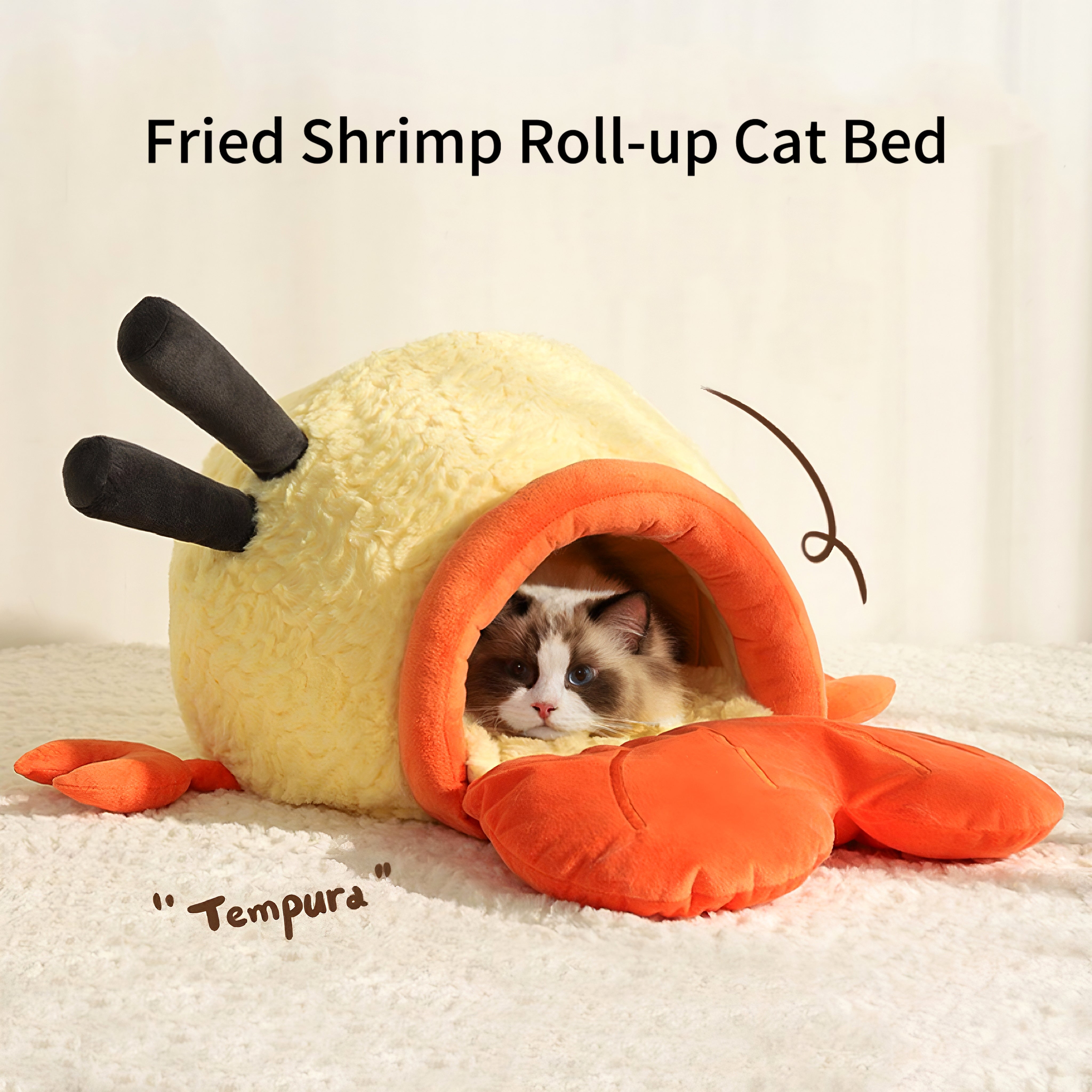 A cat bed in the shape of fried shrimp